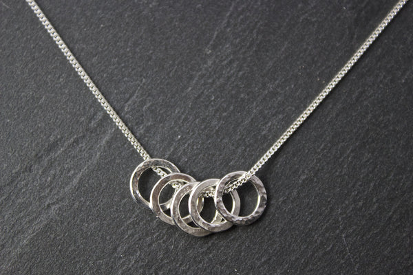 Pendant with five small circles