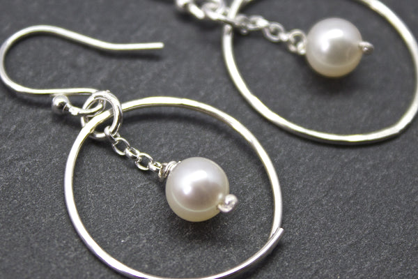 Earrings with circle and freshwater pearl drop