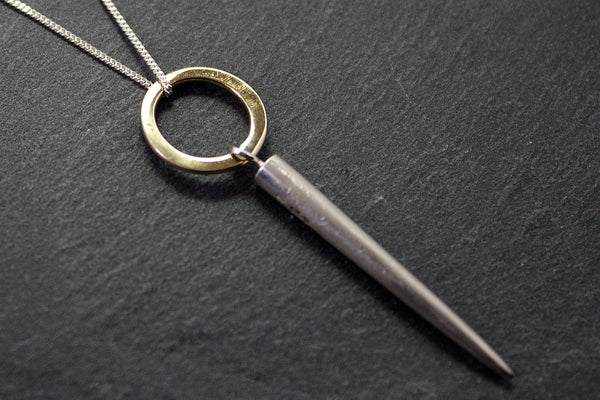 Pendant with circle and spear drop