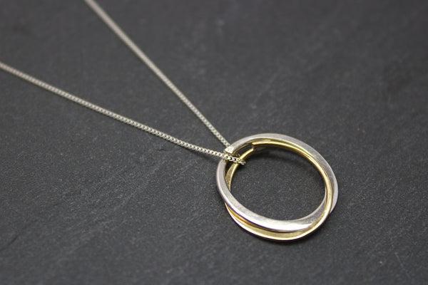 Pendant with two small circles