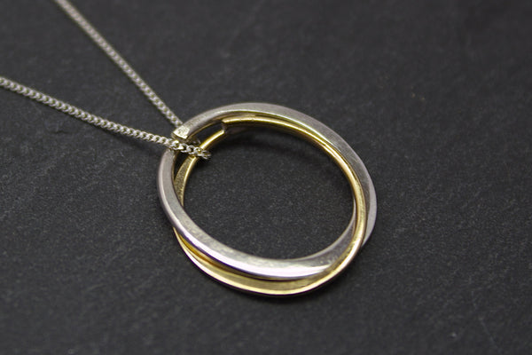 Pendant with two small circles