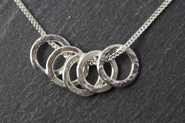 Pendant with five small circles