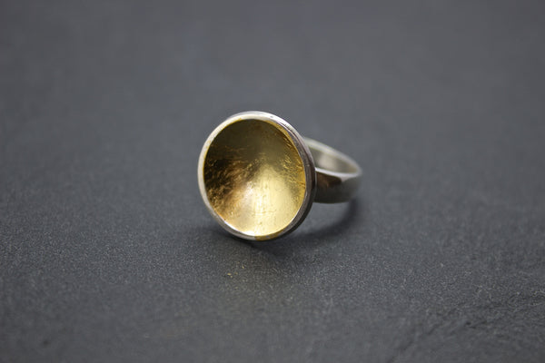 Ring with silver and gold leaf dome
