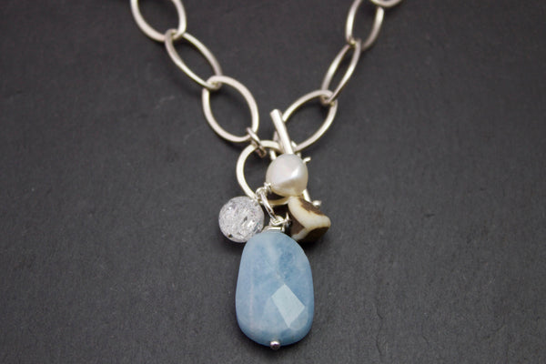 Necklace with aquamarine, rock crystal, pebble and pearl.