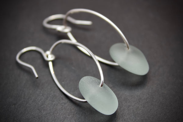Earring with oval and sea glass drop