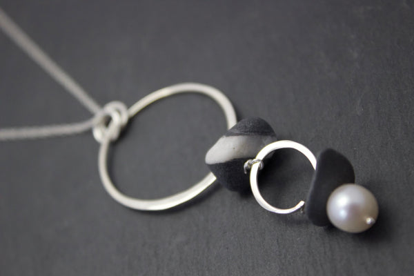 Pendant with granite quartz pebbles and slate