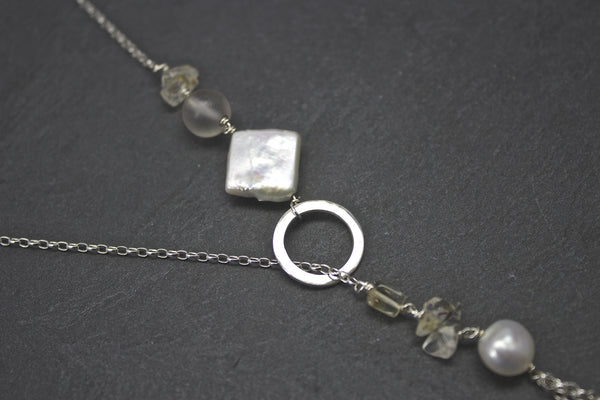 Pendant with citrine and three strand chains