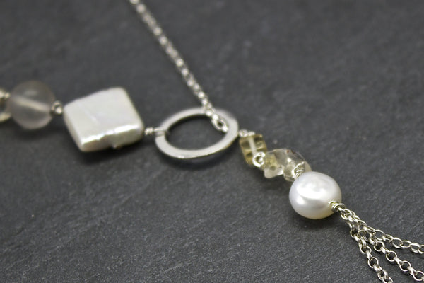 Pendant with citrine and three strand chains