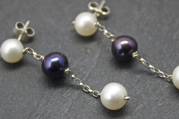 Earrings with three freshwater pearls