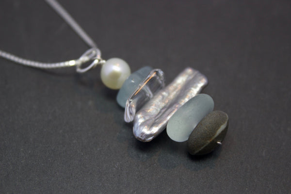 Pendant with pearls and pebbles
